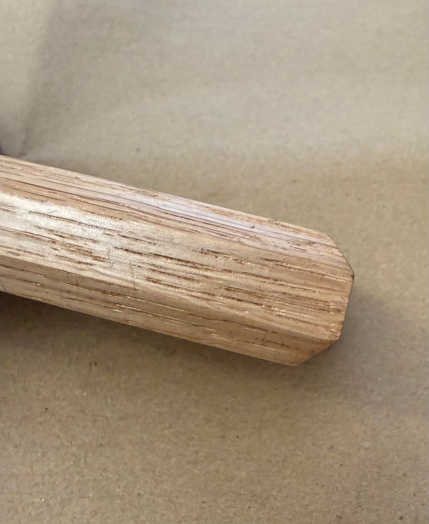 Close-up of oak display plinth edge detail